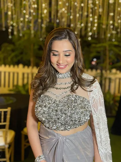 A close-up of the finished engagement look. Notice the sheer, luminous quality of the skin and the soft definition on the eyes, creating a look that is both bold and breathtakingly elegant.