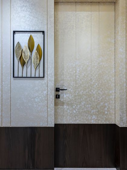 The passage and door design of this Mumbai home redefines sophistication. With seamless detailing and a focus on aesthetics, the space connects rooms while adding a sense of grandeur and harmonious flow.