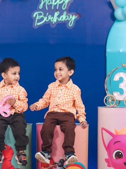 Double the fun with a Cocomelon and Baby Shark theme for these twin boys turning three. We combined elements from both shows to create a vibrant and playful backdrop that the kids absolutely loved.