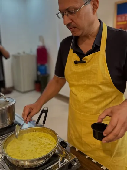 Adding the final touches to a dish during the cooking workshop. I believe that the energy with which you cook is transferred to the food, so we always cook with love and positive intention.