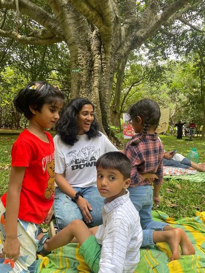 A candid moment of conversation with the children after a story. This dialogue is important for helping them process the story's themes and connect it to their own lives.