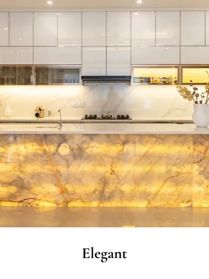 The kitchen can be a home's most dramatic showpiece. For this design, I used a backlit onyx island as the glowing centerpiece. It combines high-end luxury with everyday practicality, creating a space that is both a functional cooking area and a stunning work of art.