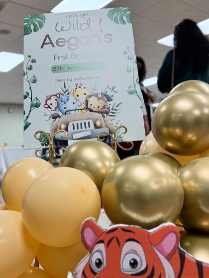 A personalized welcome sign for Aegon's 'Let's get Wild' first birthday party.