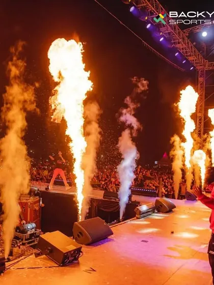 We bring full-scale concert production to life. Here, artist Diljit Dosanjh performs on stage, flanked by powerful jets of fire, showcasing the professional pyrotechnics we can arrange.