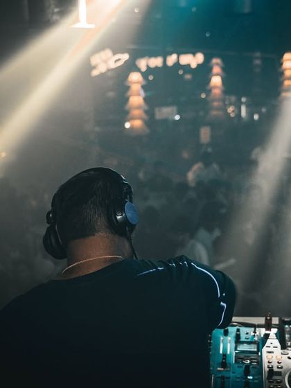 A powerful shot from behind, looking out over a hazy, atmospheric dancefloor at Boho. The spotlights create a dramatic effect, putting me right in the center of the action.