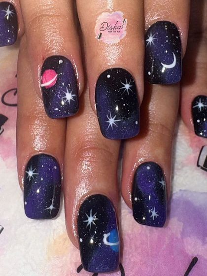 A beautiful galaxy-inspired design with a deep purple and black base, sparkling stars, and planets.