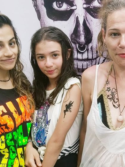 A family of clients from abroad who visited my studio for some new ink.