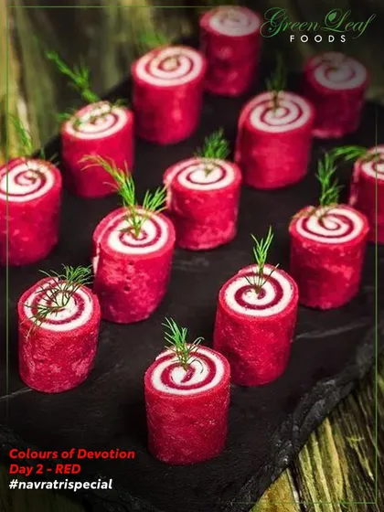 These vibrant red beetroot and cream cheese pinwheels are as beautiful as they are delicious. Garnished with fresh dill, they add a pop of color and a sophisticated flavor to any appetizer spread.