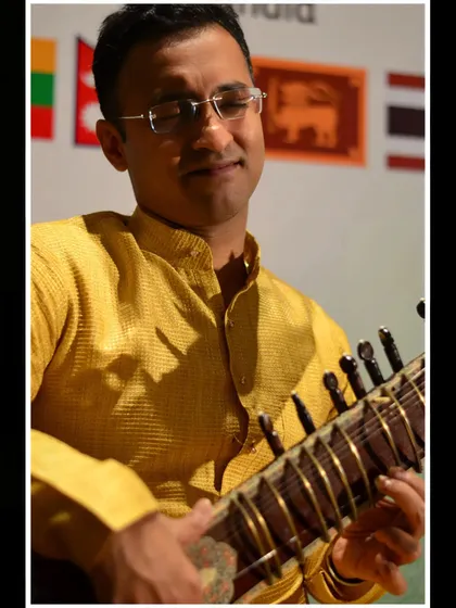 A close-up capturing a moment of deep musical thought.
