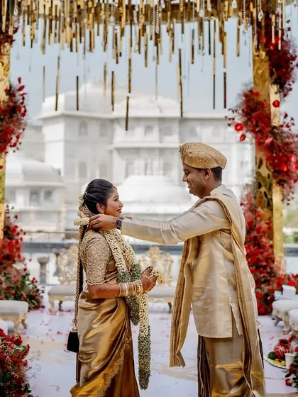 A destination wedding that blends southern tradition with royal grandeur. Capturing Nisha and Shreyas against the magnificent backdrop of Fairmont Jaipur was a storyteller's dream.