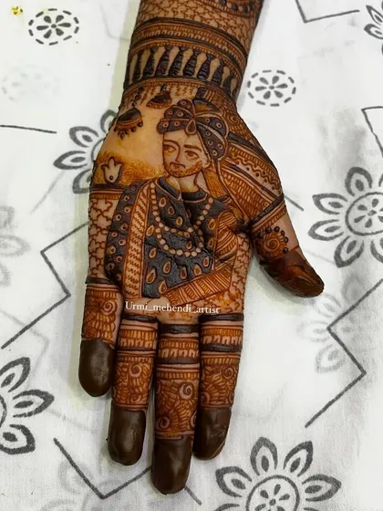 A detailed portrait of a groom in his wedding attire. This level of personalization is what makes my bridal mehendi so special and unique to each couple.