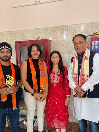 Our team proudly holding their awards. These moments inspire us to continue our mission of promoting health and well-being through yoga.