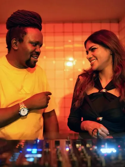 Me and my MC, Bobkat. We’re a team, a duo that brings the energy. While I’m on the decks dropping beats, he’s on the mic keeping the crowd hyped. It’s the complete interactive experience.