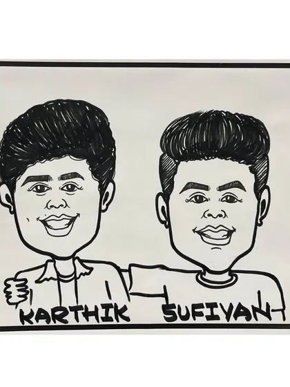 A black and white marker caricature of two friends, drawn live at an event for Universal School in Mumbai. This classic style is always a hit.