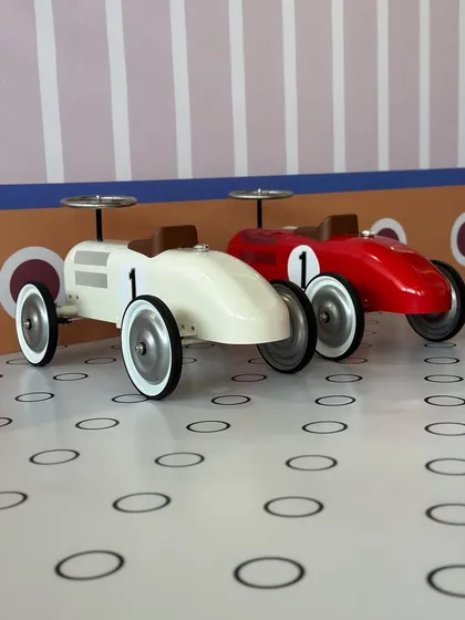 Our classic-style ride-on cars, ready for the next race. They are perfect for imaginative play.
