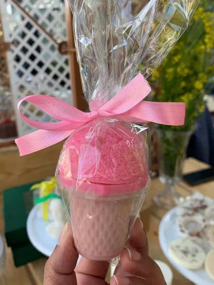 A sweet strawberry-scented ice cream cone soap, a nostalgic and creamy treat for your bath routine.