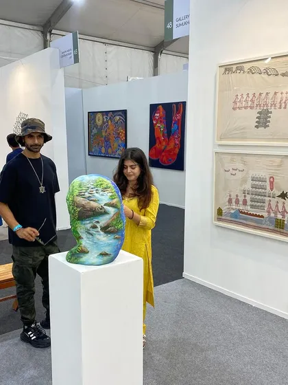 Another shot of our celebrity guests engaging with the art.