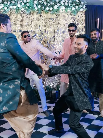 The groom's squad brings incredible energy to the Sangeet dance floor. We make sure to capture these high-energy moments of celebration.