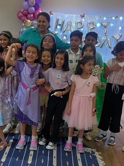 At the end of the day, it's all about these million-dollar smiles. This happy group photo from a birthday party captures the pure joy and new friendships made. My goal is to make every child's special day unforgettable.
