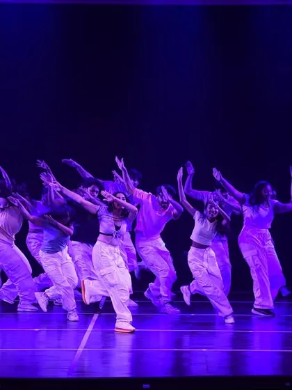 A full-cast performance showing a large group moving in perfect sync. This demonstrates our ability to choreograph for large ensembles, ensuring everyone hits their mark with power and precision.