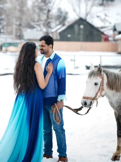 Your love story deserves an epic setting. This ombre blue gown stands out beautifully against the snow, showing how my rental gowns can travel with you to create magic anywhere.