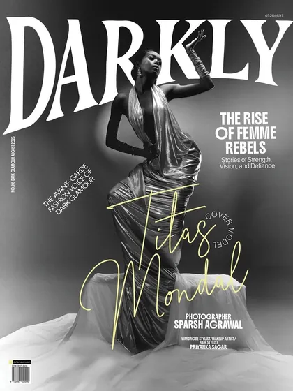Seeing my work on the cover of Darkly Art Magazine was a defining moment. This project was about capturing the spirit of a "femme rebel" through dramatic posing, a liquid-metal gown, and a makeup look that is both powerful and graceful.