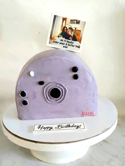 A fun and trendy Polaroid camera cake. This no-fondant design can be personalized with a favorite photo, making it a sweet and memorable gift.