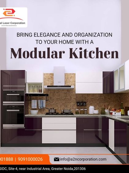 A two-tone modular kitchen featuring deep purple and white high-gloss cabinets. This design shows how we integrate appliances like a chimney and double oven seamlessly into the cabinetry for a clean, organized look.