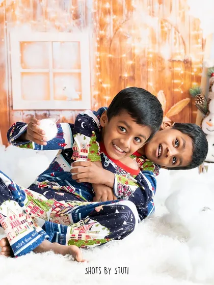 Brotherly love and holiday fun. These two are having a blast in their matching pajamas in my snowy Christmas set.