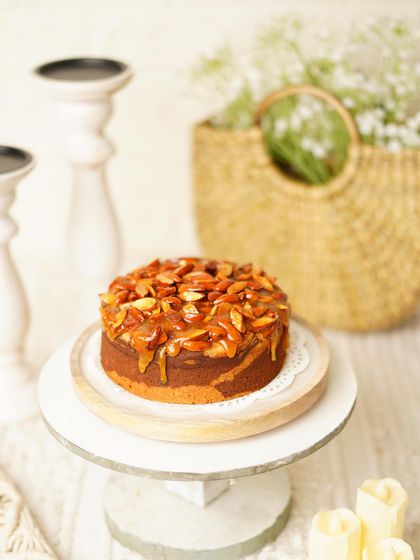 The Almond Praline Teacake, unadorned and simply beautiful. A soft, buttery cake topped with a crunchy, sweet almond praline.