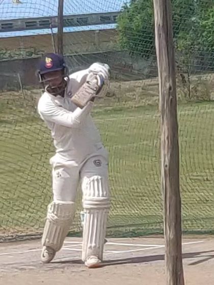 This batsman is captured mid-shot, displaying the power and technique we cultivate during our batting coaching sessions.