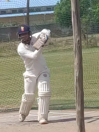 This batsman is captured mid-shot, displaying the power and technique we cultivate during our batting coaching sessions.