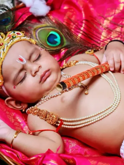 Our studio is equipped for creative and themed newborn photoshoots. This Janmashtami-themed session for a sleeping baby shows our attention to detail in styling, props, and safe posing to create a truly unique portrait.
