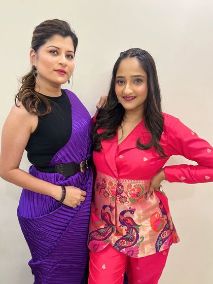 A stylish portrait of the two artists. I created distinct looks for each of them that complemented their individual outfits and personalities.