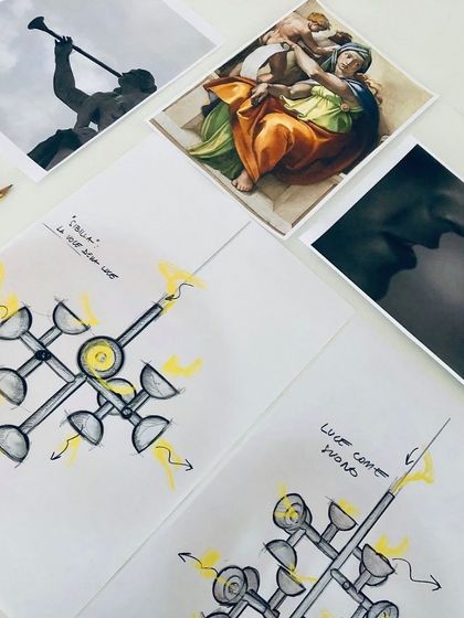 The original design sketches and inspiration board for the Sibilla chandelier, offering a glimpse into the creative process of designer Luca De Bona.