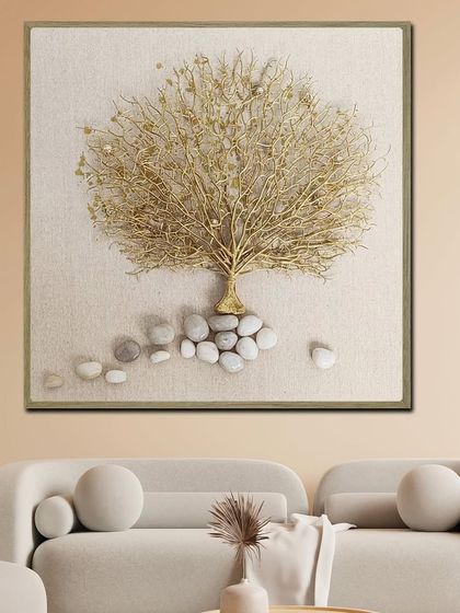 Rooted in beauty, this 3D Tree of Life shadow box is crafted with a delicate golden tree and real, natural pebbles at its base. It's a symbol of harmony and prosperity for your home.