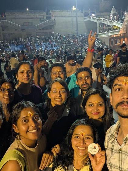 A happy group selfie after the Ganga Aarti in Haridwar. Sharing these spiritual moments together creates a special bond.