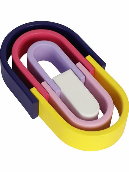 An angled, nested view of a wooden rainbow arch toy.