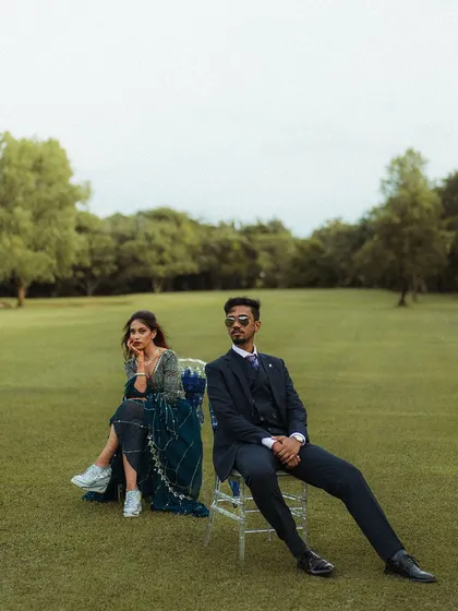 Modern style meets natural beauty. This editorial-style portrait of Aman and Fazilah in a wide-open field plays with composition and attitude, creating a cool and contemporary couple portrait.