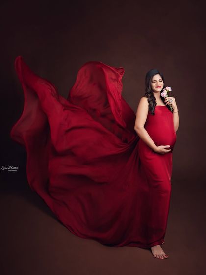 Capturing the fabric in motion creates a sense of life and energy. This flowing red gown looks incredible when tossed, creating a dynamic and powerful image.