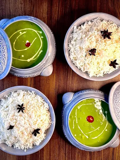 An artful presentation of my Thai Green Curry and Jasmine Rice, served in beautiful ceramic bowls. I believe that food should be a feast for the eyes as well as the palate.