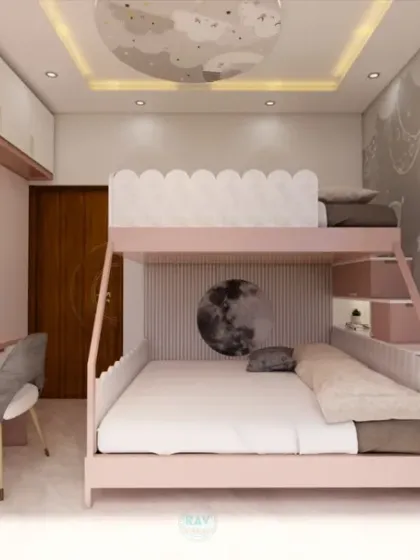 Another view of the pink-themed kids' room, showing the bunk bed with a moon-shaped cutout and a well-organized study area.