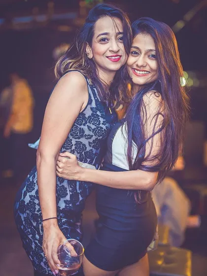 Two friends enjoying the night.