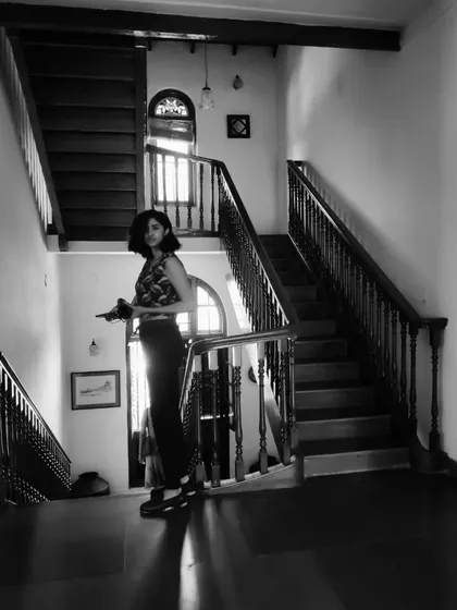 This black and white shot captures a more artistic and editorial side of my modeling. I love playing with light, shadow, and architecture to create a specific mood, making it perfect for more stylized brand campaigns or lookbooks.