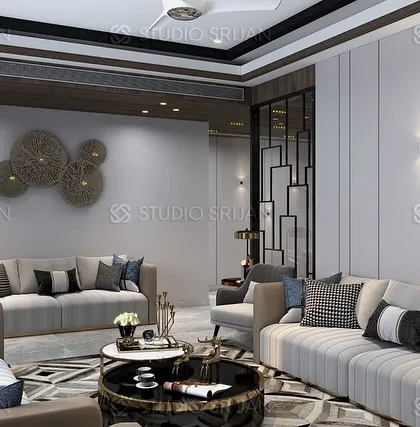 Another view of the Sushant Lok drawing room, highlighting the use of metallic wall art and decorative partitions to add layers of interest.