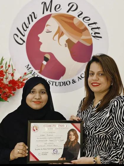 A proud moment with another graduate. It is so rewarding to see my students achieve their goals and earn their professional certification.