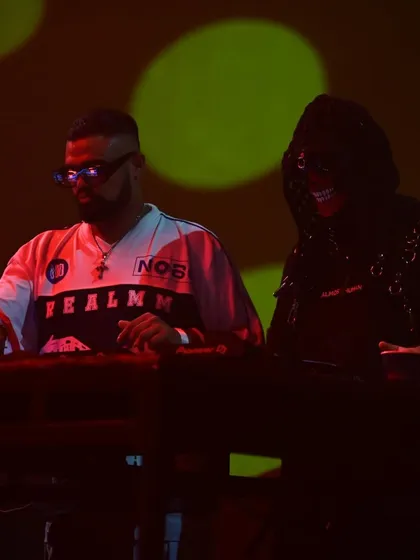 Red lights and high energy during another F2F performance. We match our track selection to the visual production for maximum impact.