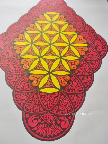 A slightly different angle of the same detailed mandala, highlighting the texture and depth created by layering different patterns.