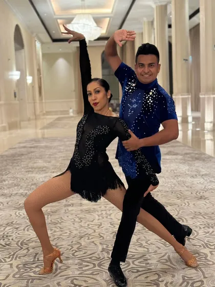 A snapshot from a professional duet performance. We focus on creating strong lines, dynamic poses, and undeniable chemistry on stage, making for a visually stunning show.