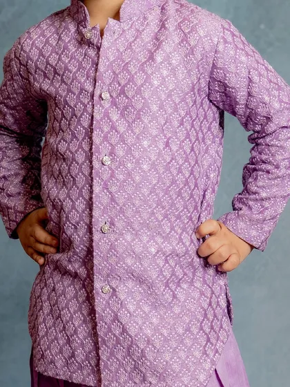 A close-up of our lavender Patiala kurta. The intricate texture of the fabric adds a touch of sophistication to this comfortable and stylish festive outfit.